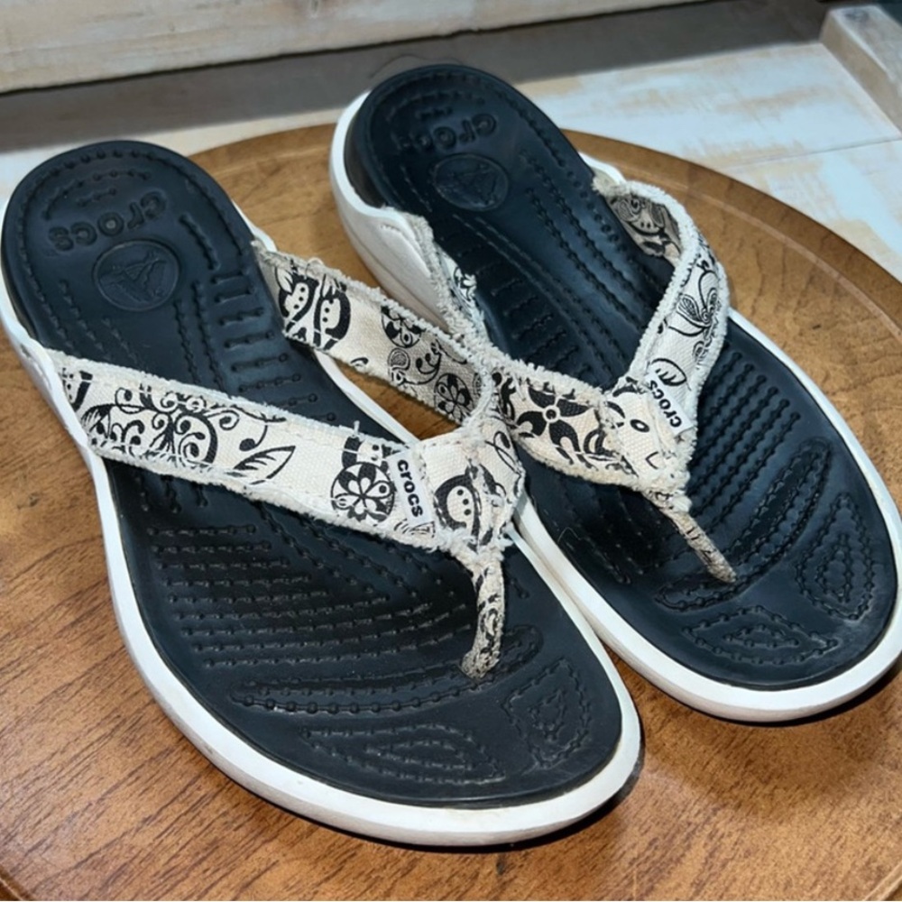 CROCS Black and Cream Sandals with Artistic Design